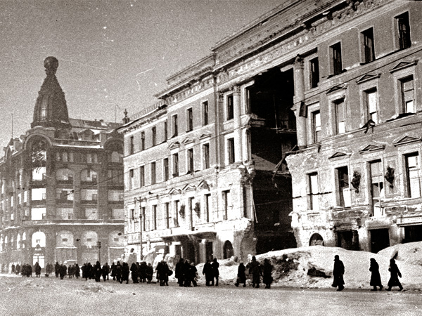 Leningrad just after the war. A building at Nevsky Prospect (the main street in the city) with a large breach caused by a German air bomb